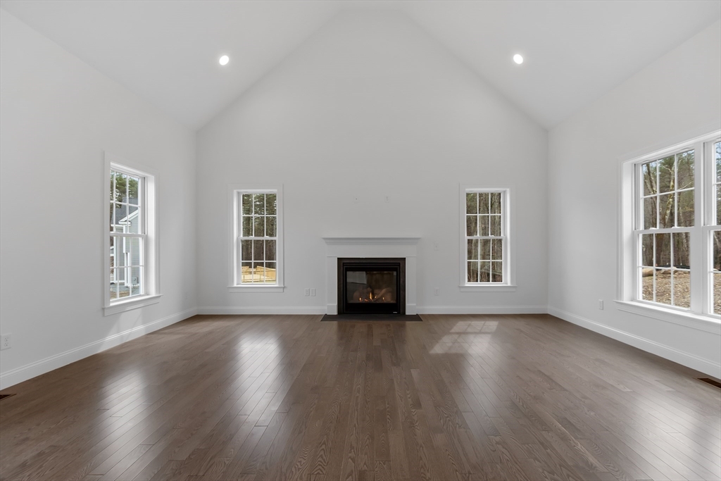 20 Rawson Farm Road Mendon, MA 01756 - Photo 8 of 35 a view of an empty room with wooden floor and a window