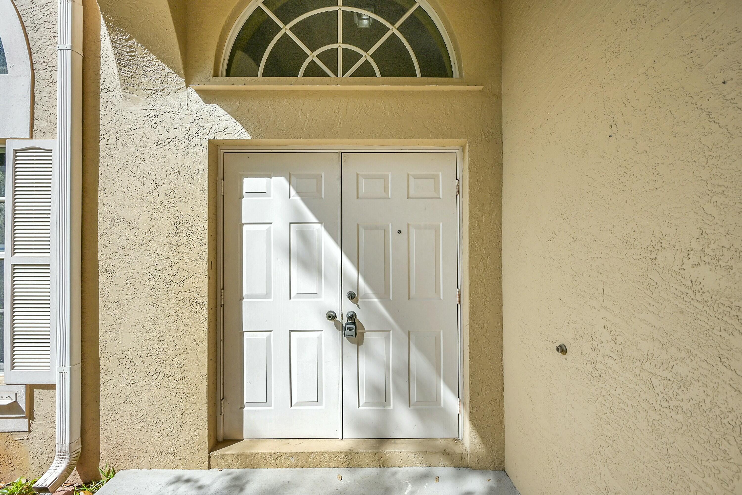106 East Lee Road Delray Beach, FL 33445 - Photo 10 of 57 Front Door