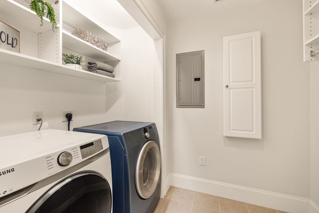 245 East Street Lexington, MA 02420 - Photo 18 of 42 a utility room with dryer and washer