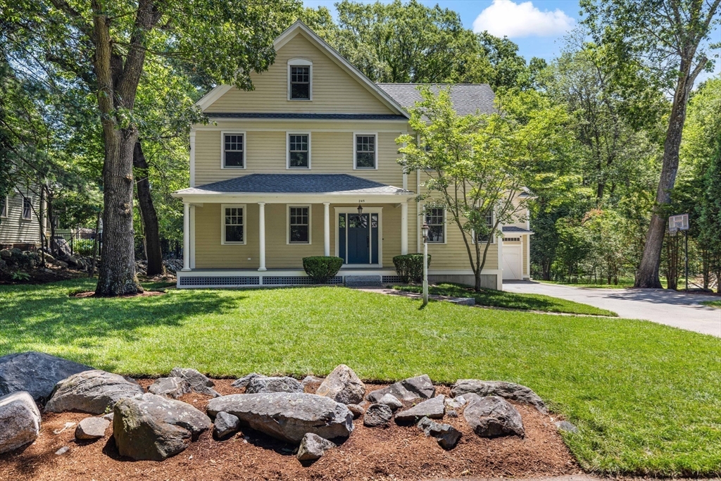 245 East Street Lexington, MA 02420 - Photo 3 of 42 a view of a house with a backyard and a tree