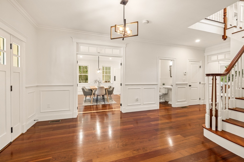 245 East Street Lexington, MA 02420 - Photo 5 of 42 a view of a living room and wooden floor