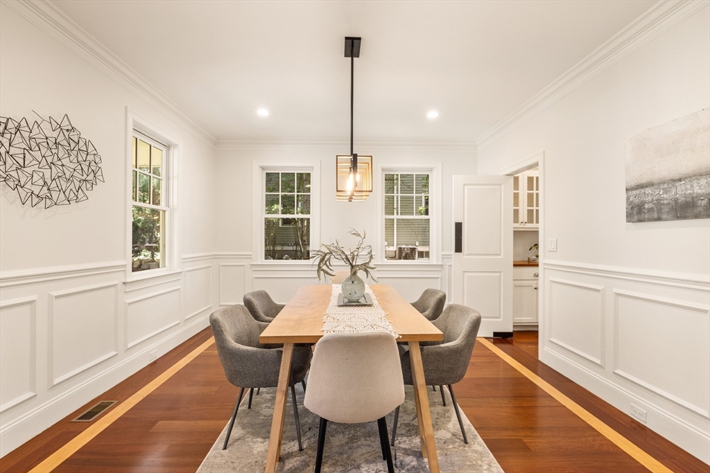 245 East Street Lexington, MA 02420 - Photo 8 of 42 a view of a dining room with furniture window and wooden floor