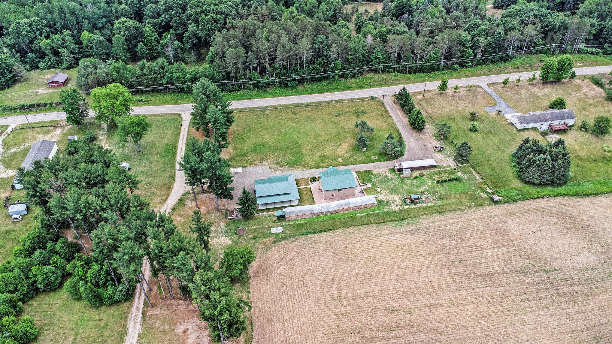 10770 21 Mile Road Evart, MI 49631 - Photo 9 of 35 Aerial Behind