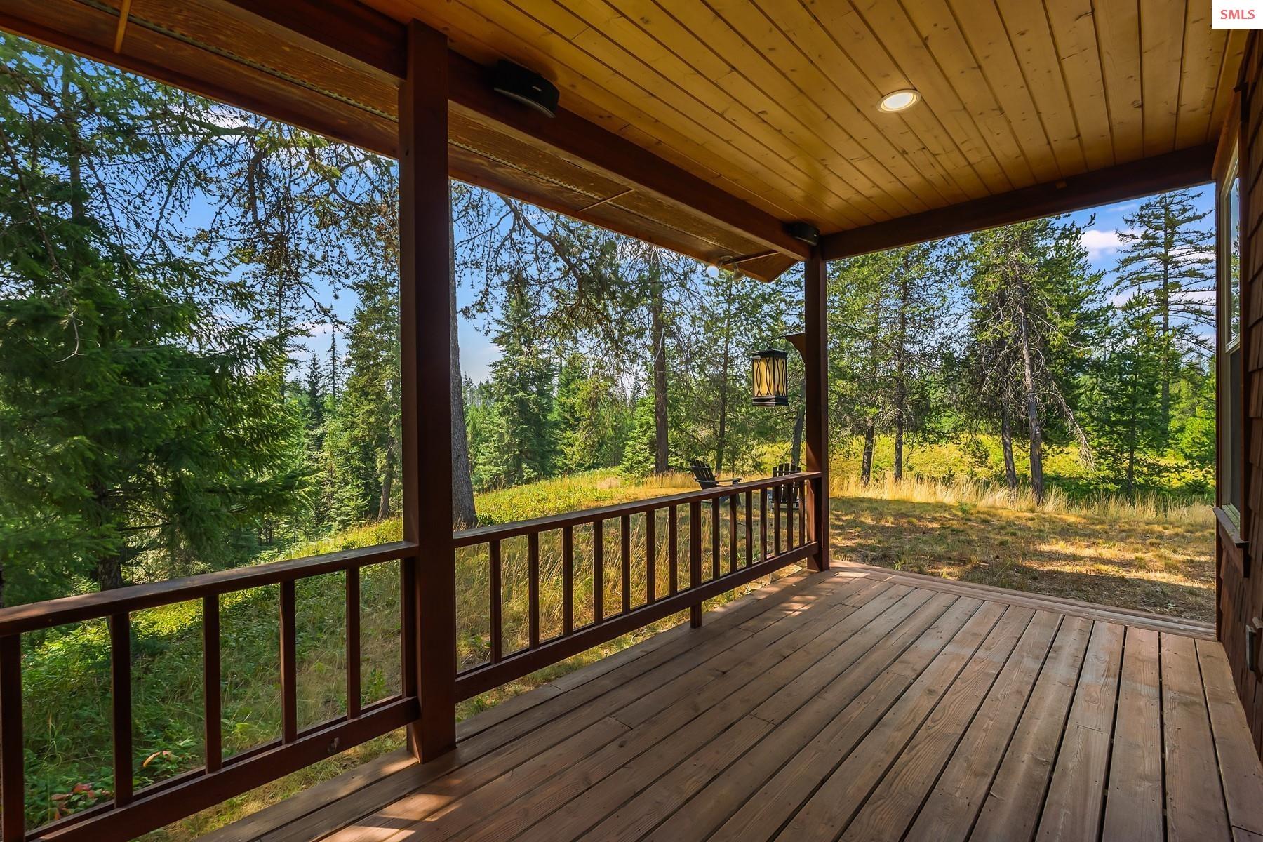 672 Hopkins Road Sandpoint, ID 83864 - Photo 39 of 61 Access the porch directly from the main living area