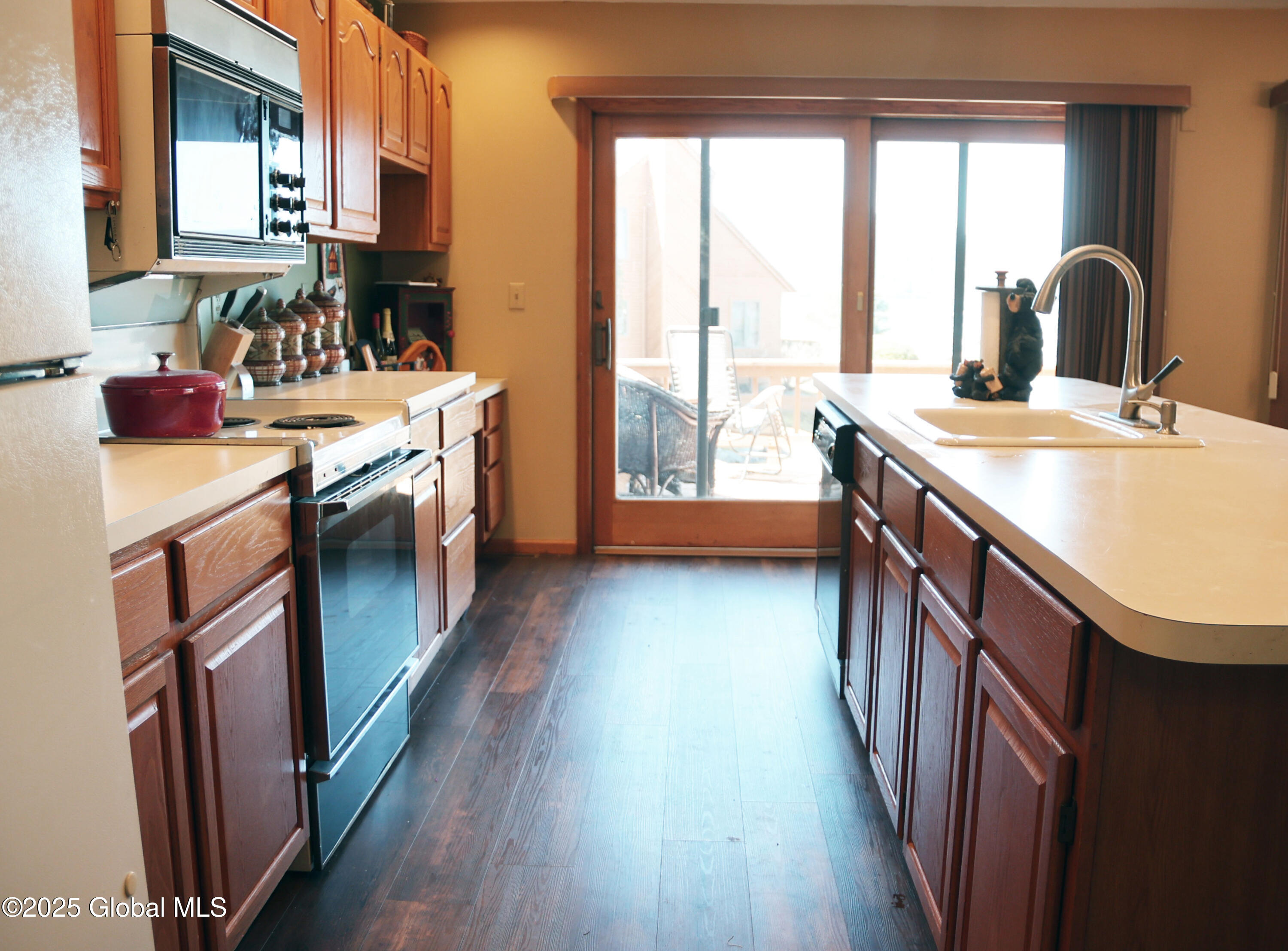 11 A Hummingbird Circle Horicon, NY 12808 - Photo 10 of 42 kitchen towards sliders to deck