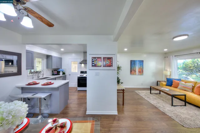 a living room with furniture and a table