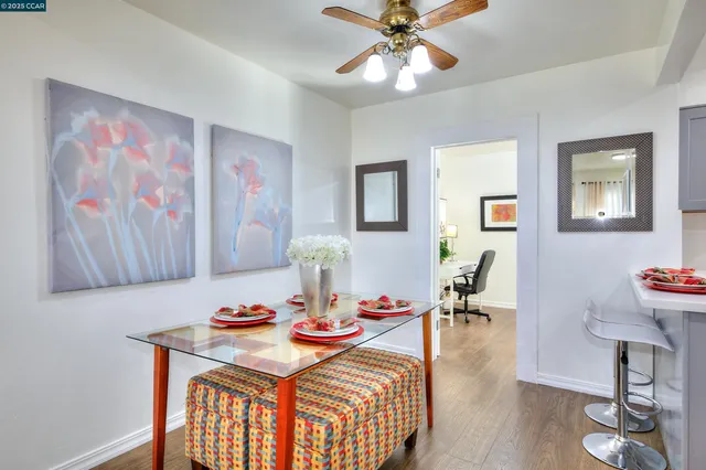 a view of a dining room with furniture
