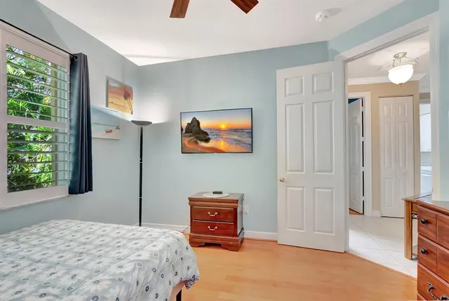 an aerial view of residential houses with outdoor space and street view