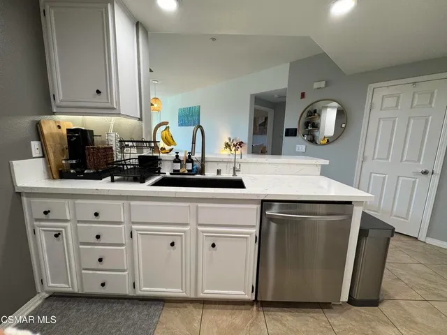 a view of a living room and dining room