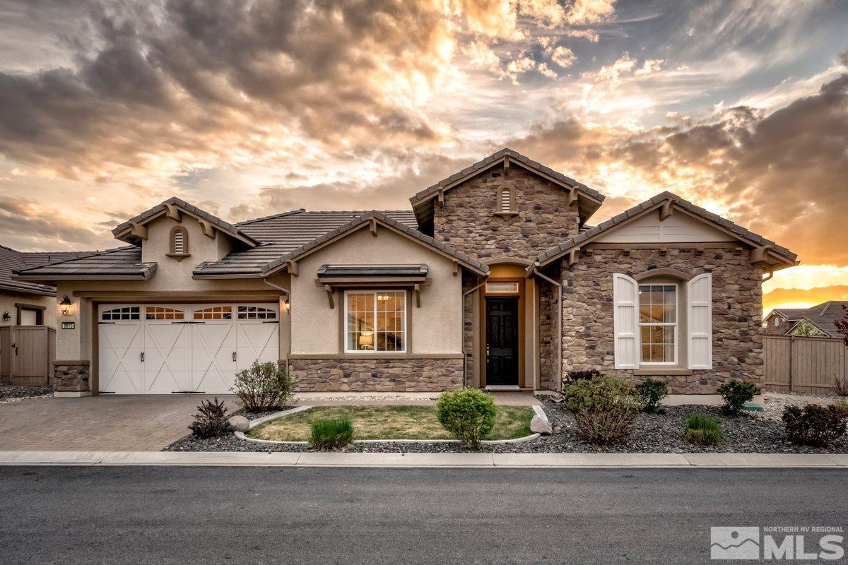 9815 Sea Bird Lane Reno, NV 89521 - Photo 1 of 40 front view of a house with a yard