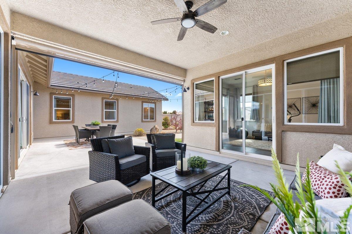 9815 Sea Bird Lane Reno, NV 89521 - Photo 23 of 40 a living room with furniture and wooden floor