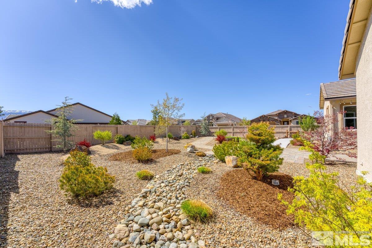 9815 Sea Bird Lane Reno, NV 89521 - Photo 25 of 40 a view of outside space and a yard