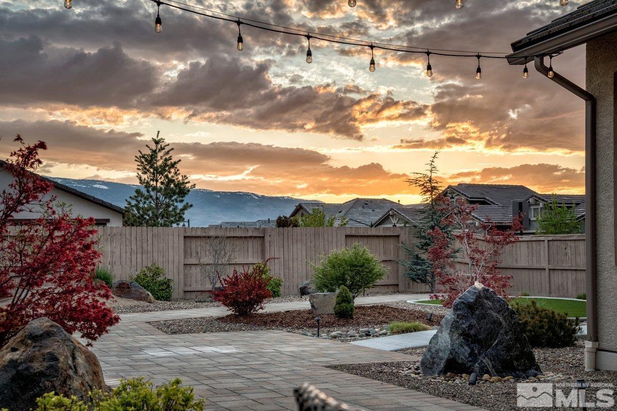 9815 Sea Bird Lane Reno, NV 89521 - Photo 31 of 40 a view of a house with a yard and a garden