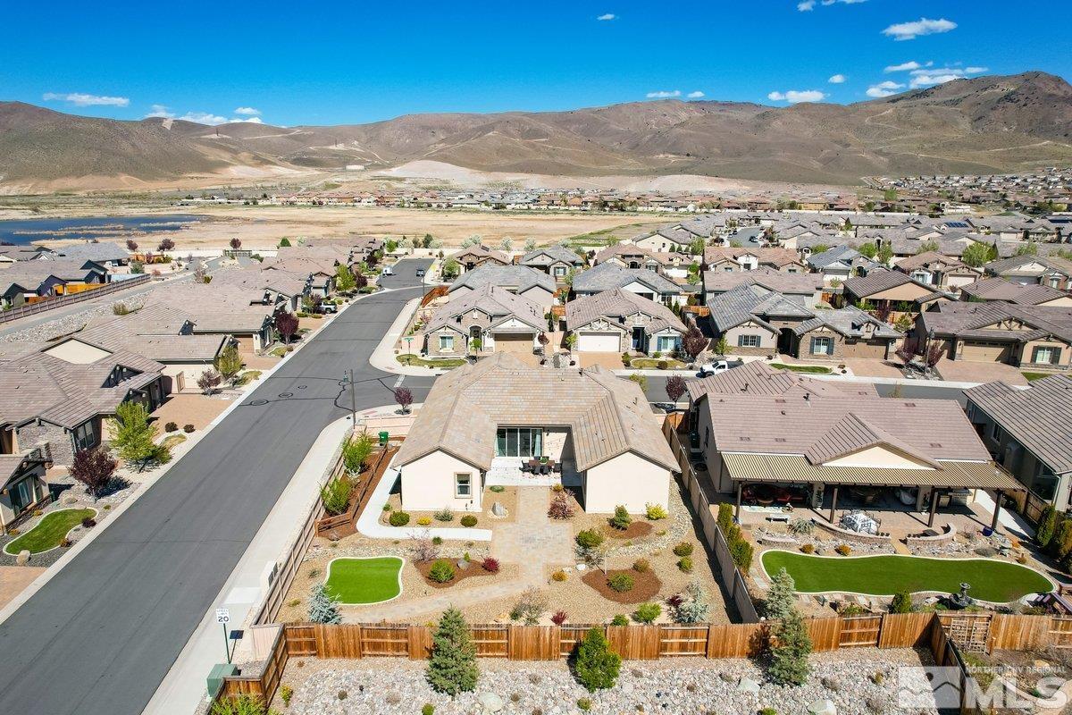 9815 Sea Bird Lane Reno, NV 89521 - Photo 32 of 40 an aerial view of residential houses with outdoor space