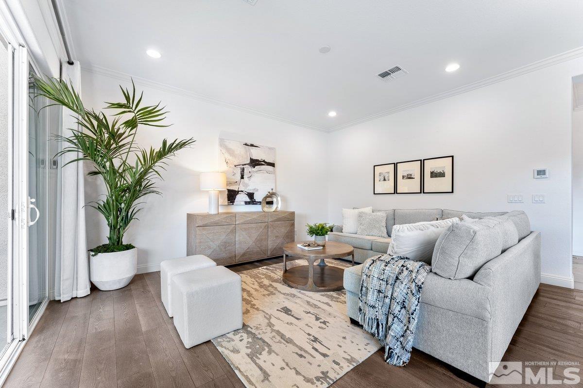 9815 Sea Bird Lane Reno, NV 89521 - Photo 6 of 40 a living room with furniture and a potted plant
