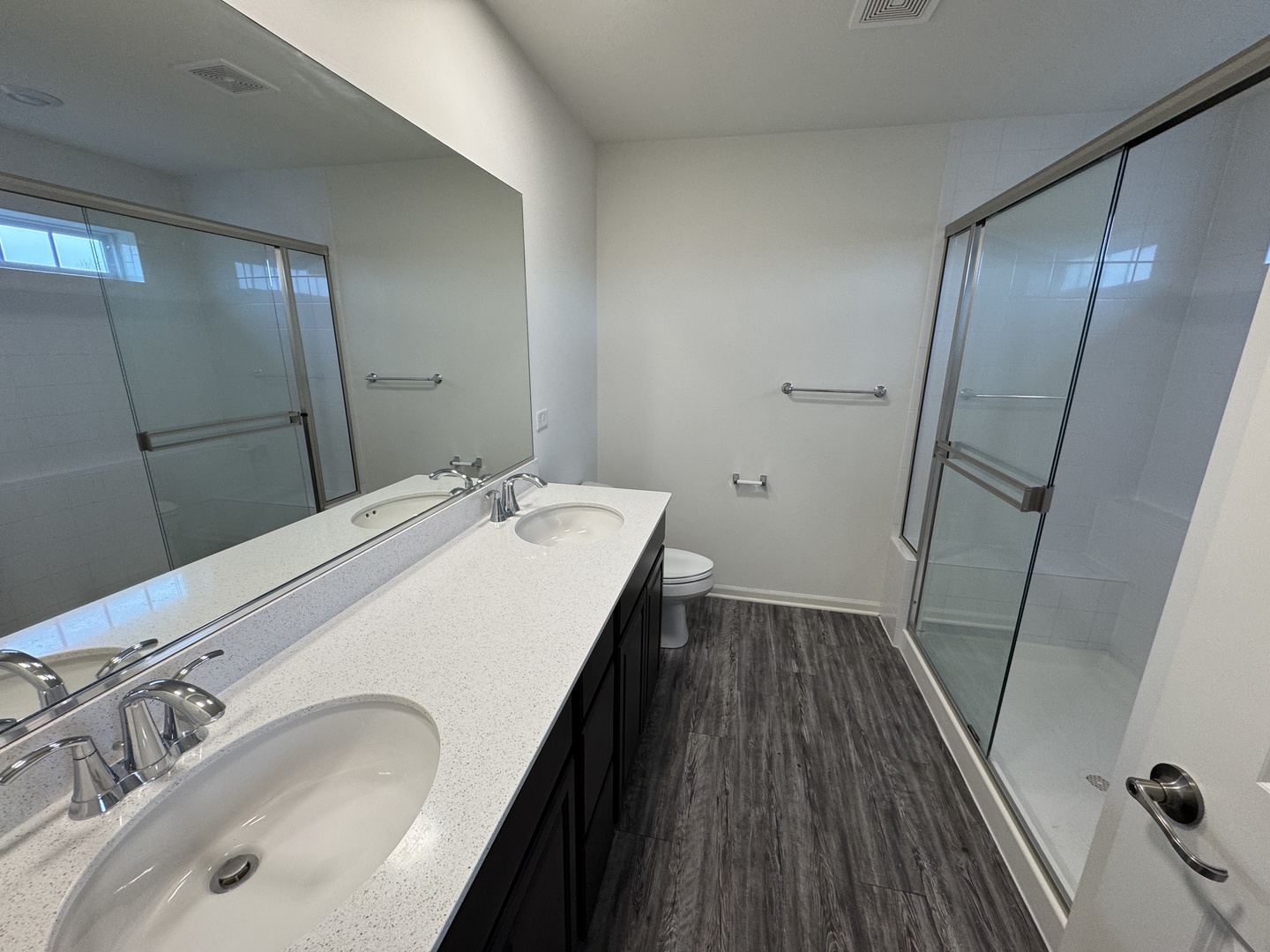 1209 Draper Road McHenry, IL 60050 - Photo 12 of 16 a bathroom with a sink and a mirror