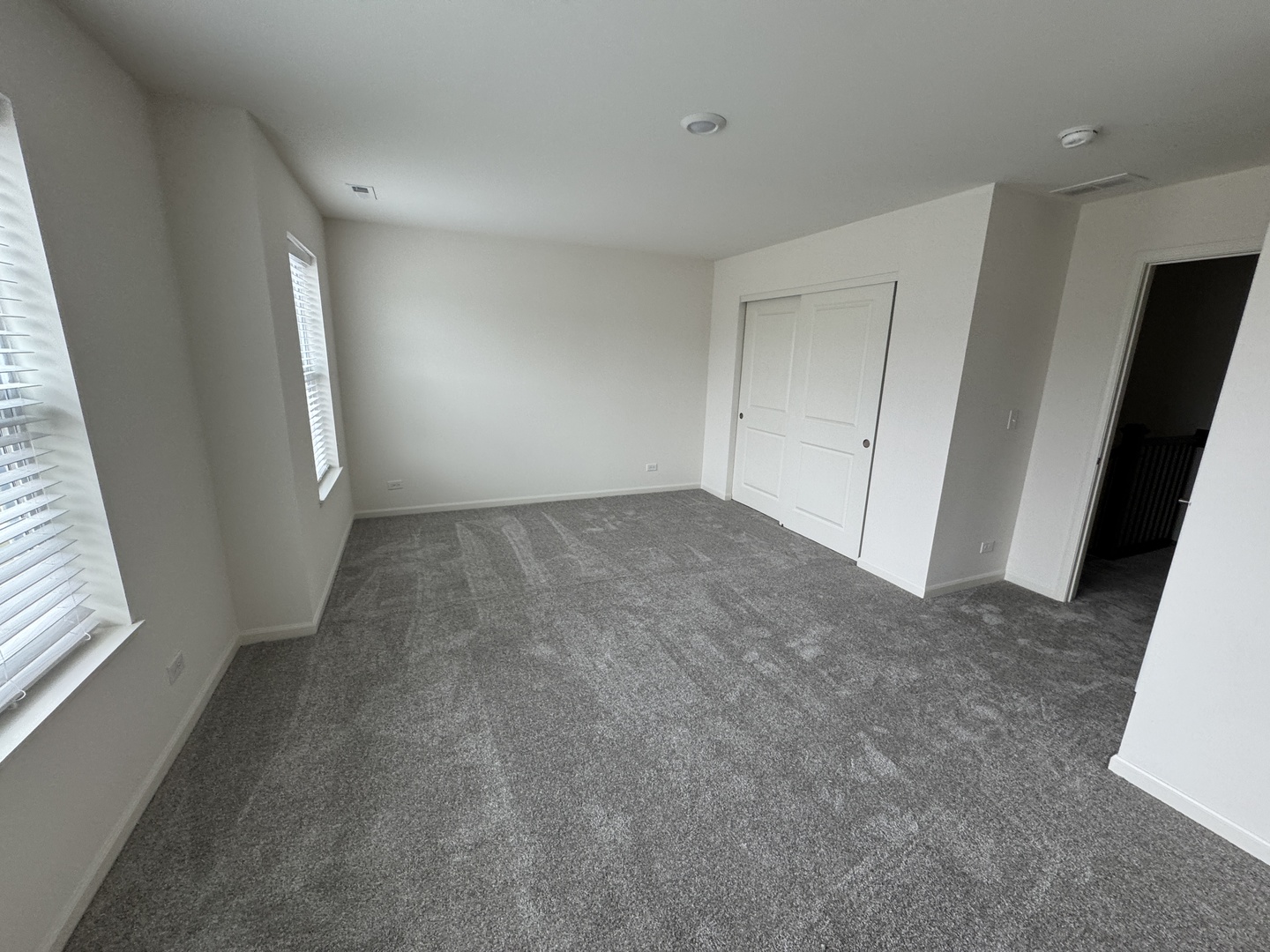 1209 Draper Road McHenry, IL 60050 - Photo 5 of 16 an empty room with windows