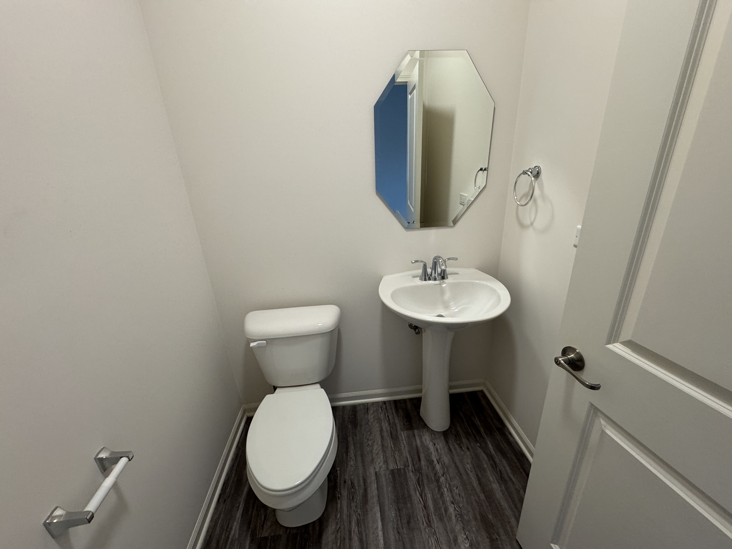 1209 Draper Road McHenry, IL 60050 - Photo 6 of 16 a bathroom with a toilet sink and mirror