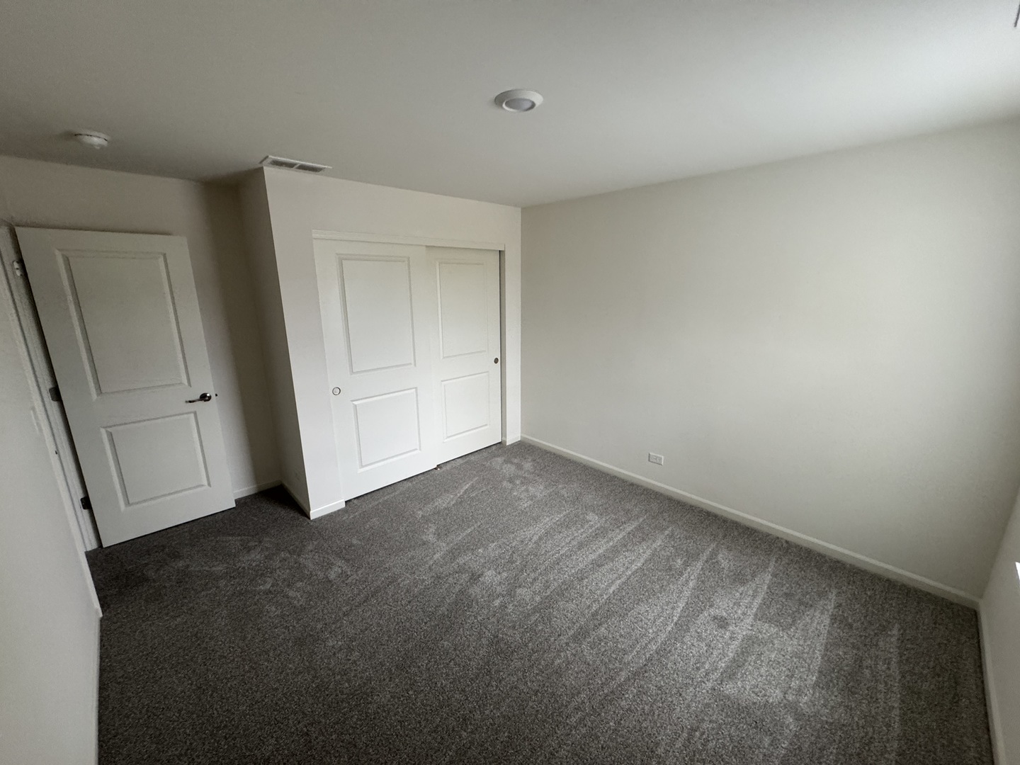 1209 Draper Road McHenry, IL 60050 - Photo 8 of 16 an empty room with closet