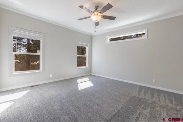 a view of an empty walk in closet