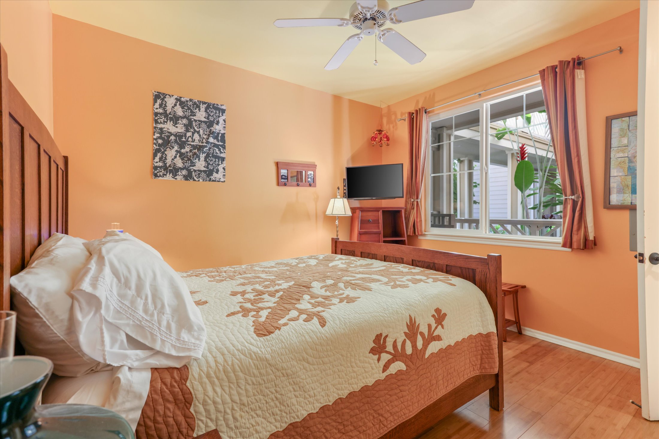 69-200 Pohakulana Place, Unit G5 Waikoloa, HI 96738 - Photo 17 of 27 a bedroom with a bed and a large window