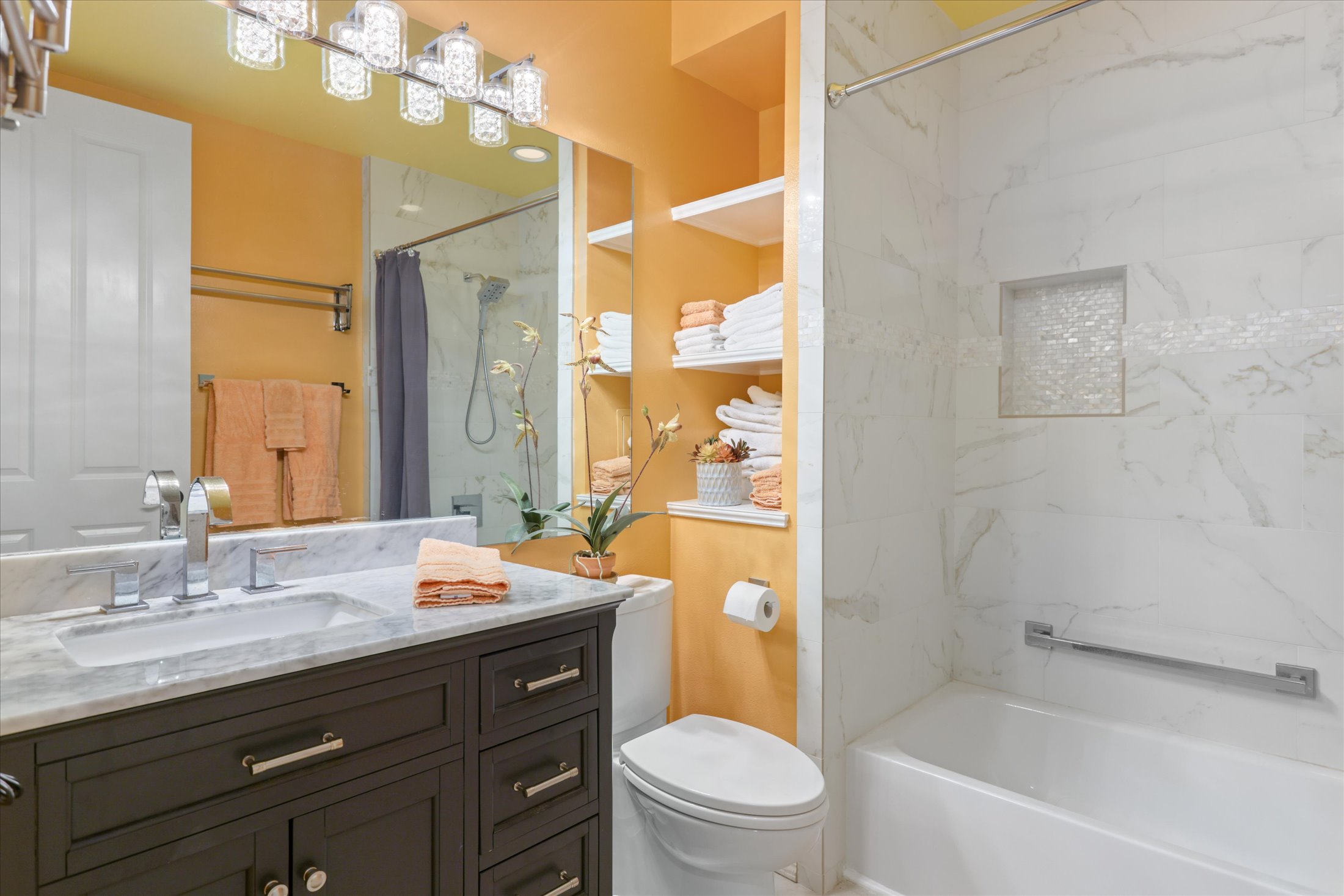 69-200 Pohakulana Place, Unit G5 Waikoloa, HI 96738 - Photo 19 of 27 a bathroom with a granite countertop toilet a sink and a bathtub