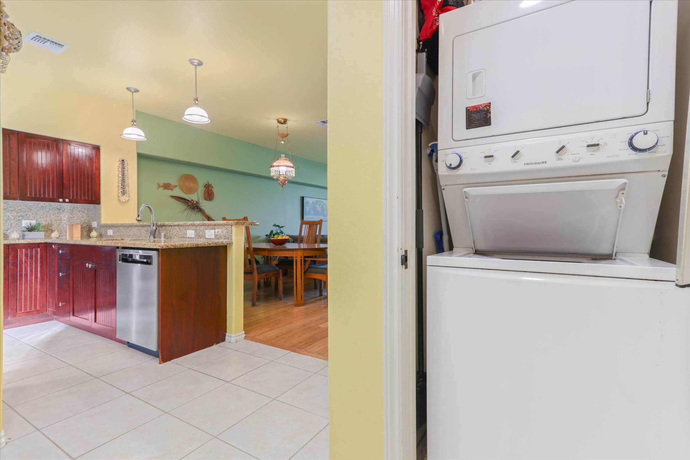 69-200 Pohakulana Place, Unit G5 Waikoloa, HI 96738 - Photo 20 of 27 a kitchen with a refrigerator and a sink