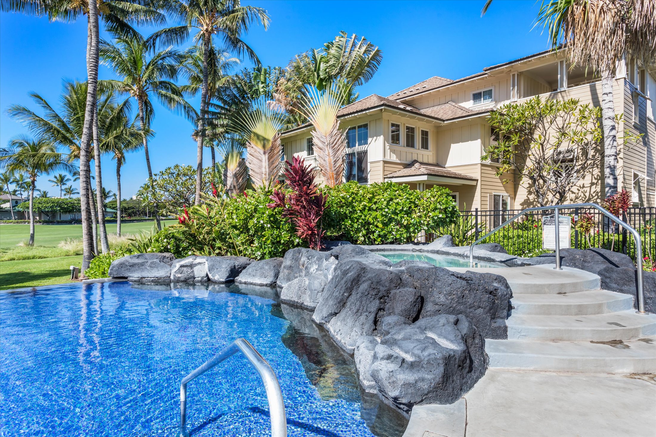 69-200 Pohakulana Place, Unit G5 Waikoloa, HI 96738 - Photo 22 of 27 a front view of a house with a yard