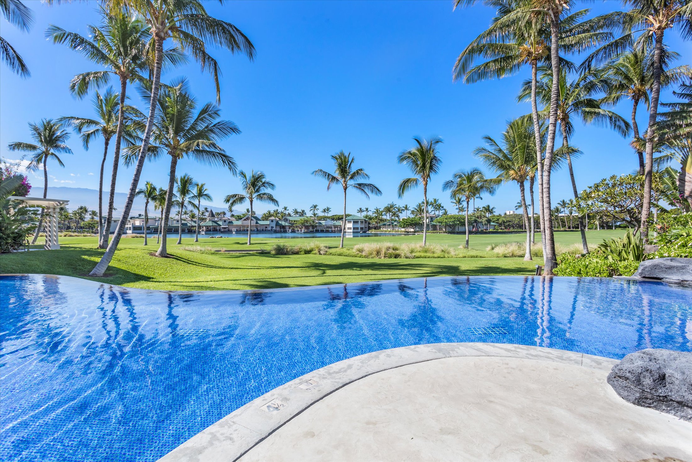 69-200 Pohakulana Place, Unit G5 Waikoloa, HI 96738 - Photo 23 of 27 a view of a park with palm trees