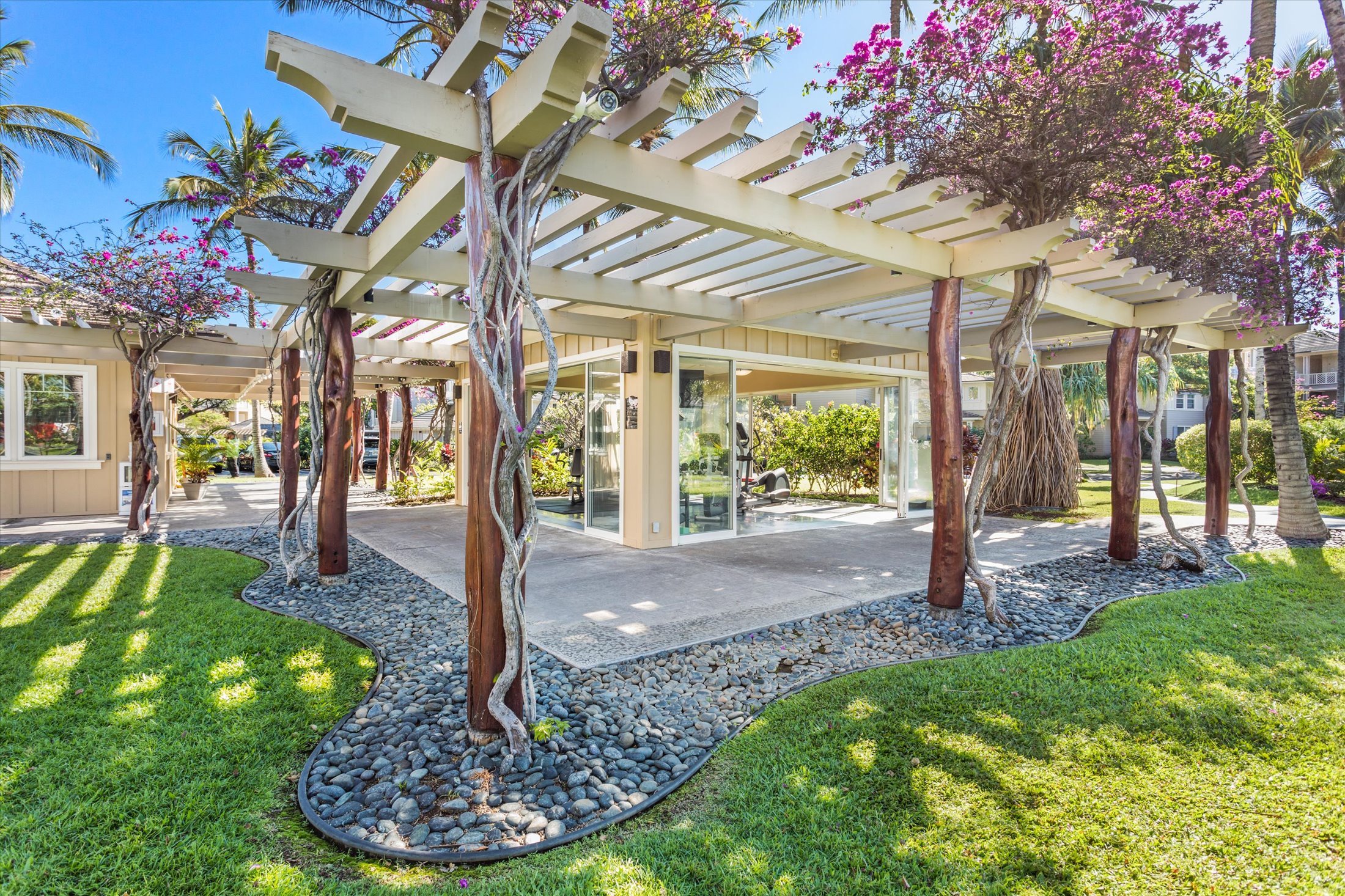 69-200 Pohakulana Place, Unit G5 Waikoloa, HI 96738 - Photo 24 of 27 a front view of a house with a yard