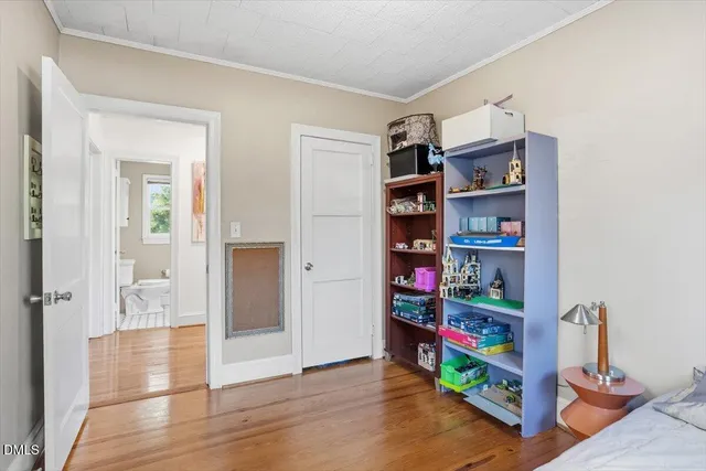 a view of backyard with outdoor seating and plants