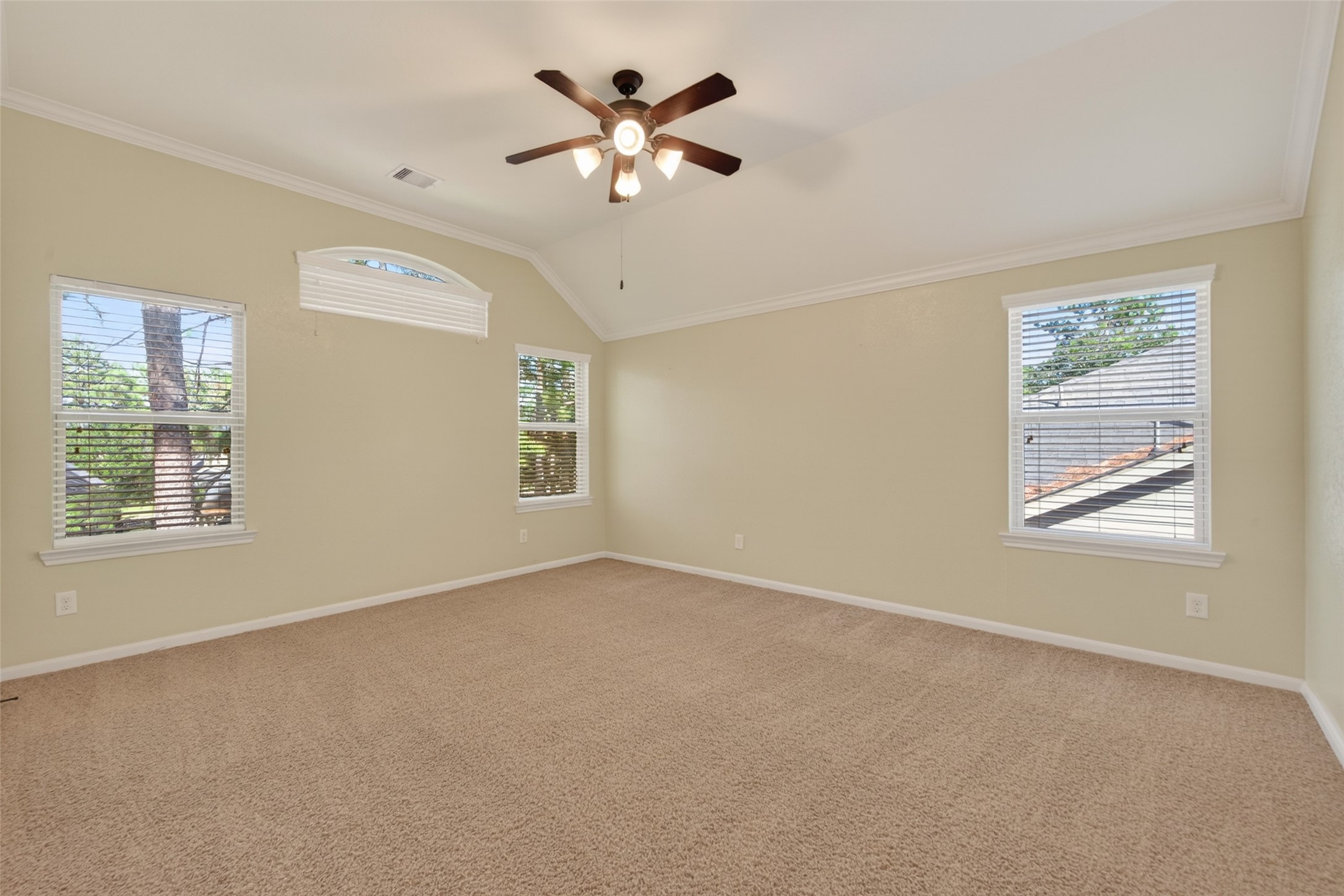 6 Painted Post Place Spring, TX 77389 - Photo 24 of 49 an empty room with windows and fan