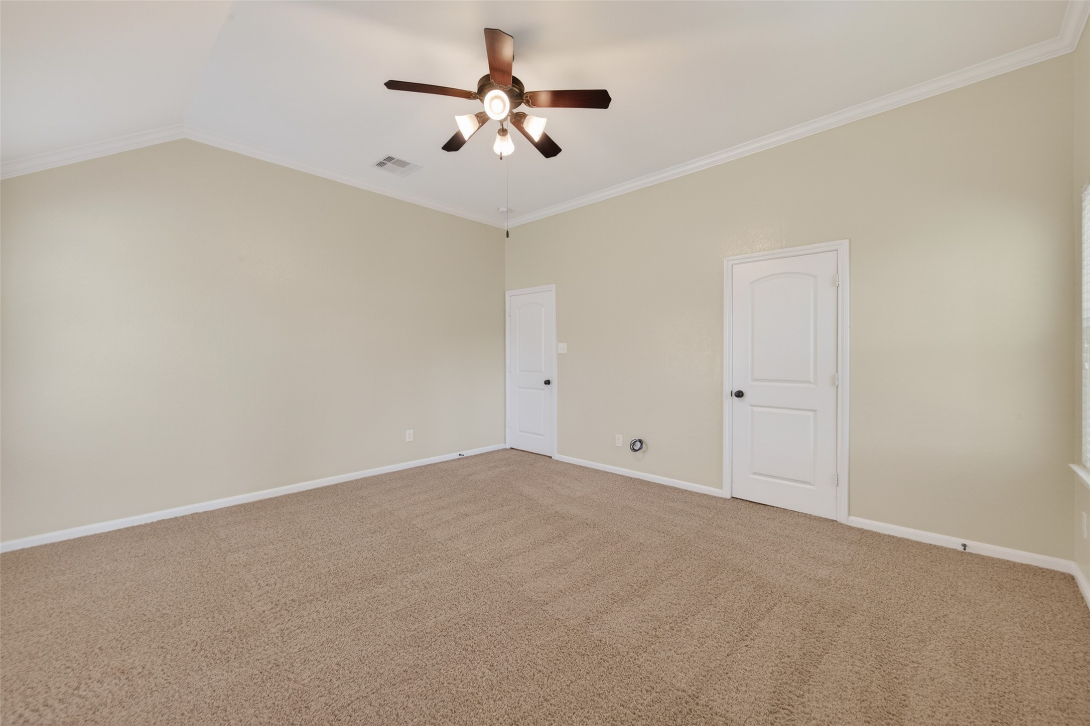 6 Painted Post Place Spring, TX 77389 - Photo 25 of 49 an empty room with a ceiling fan and a window