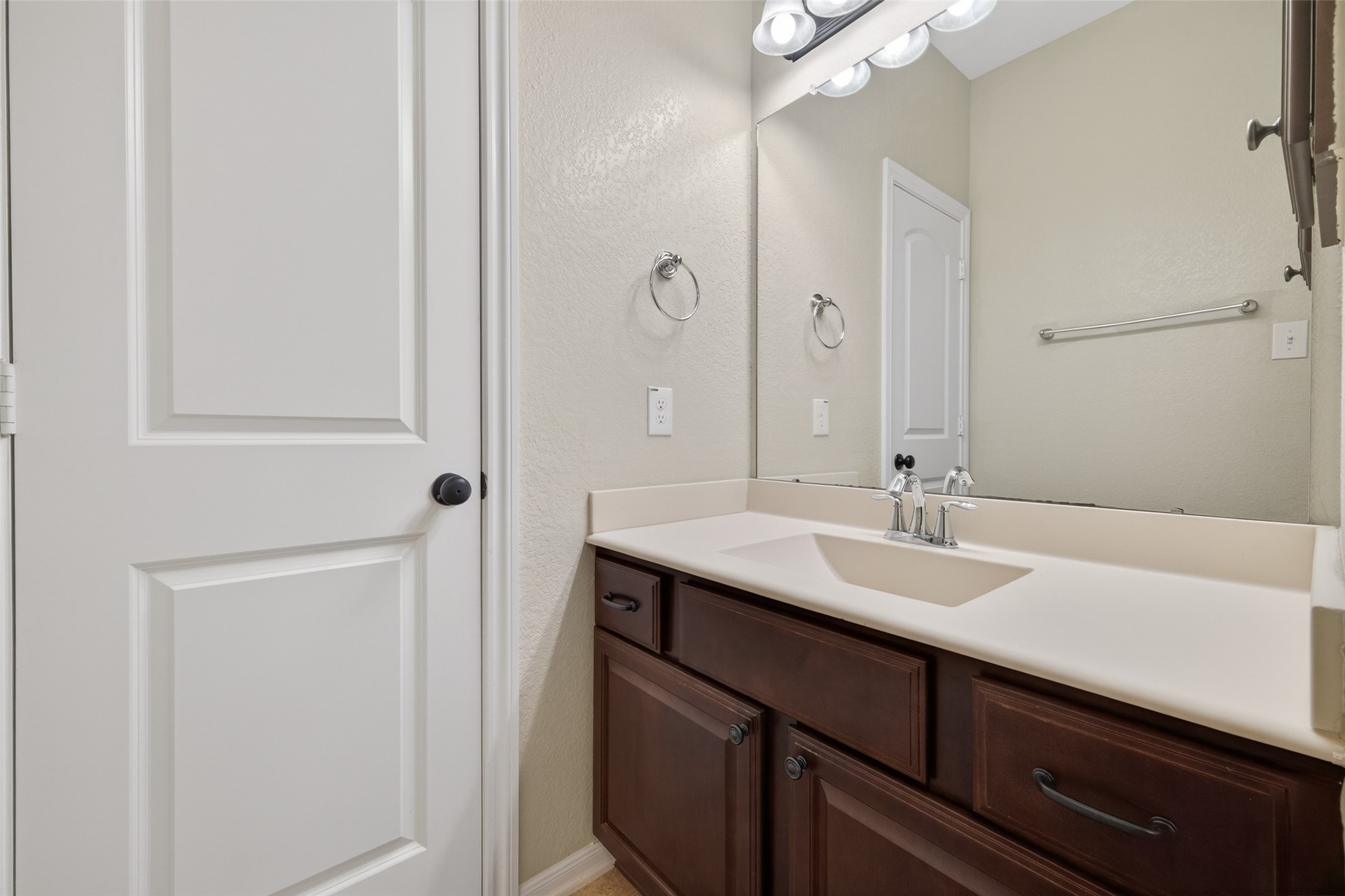 6 Painted Post Place Spring, TX 77389 - Photo 33 of 49 a bathroom with a granite countertop sink and a mirror