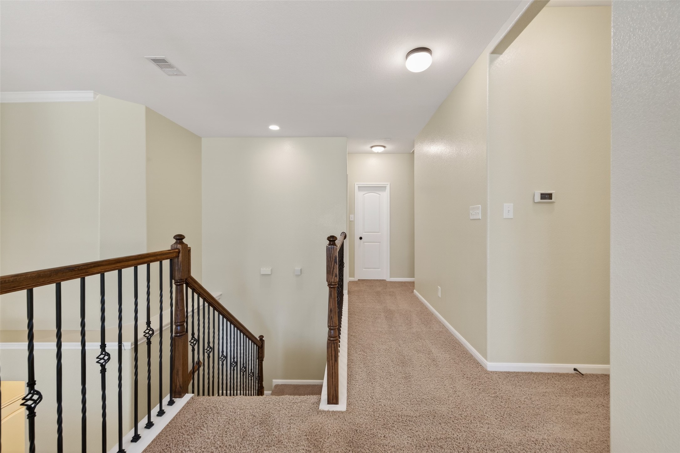 6 Painted Post Place Spring, TX 77389 - Photo 38 of 49 a view of a hallway with a livingroom