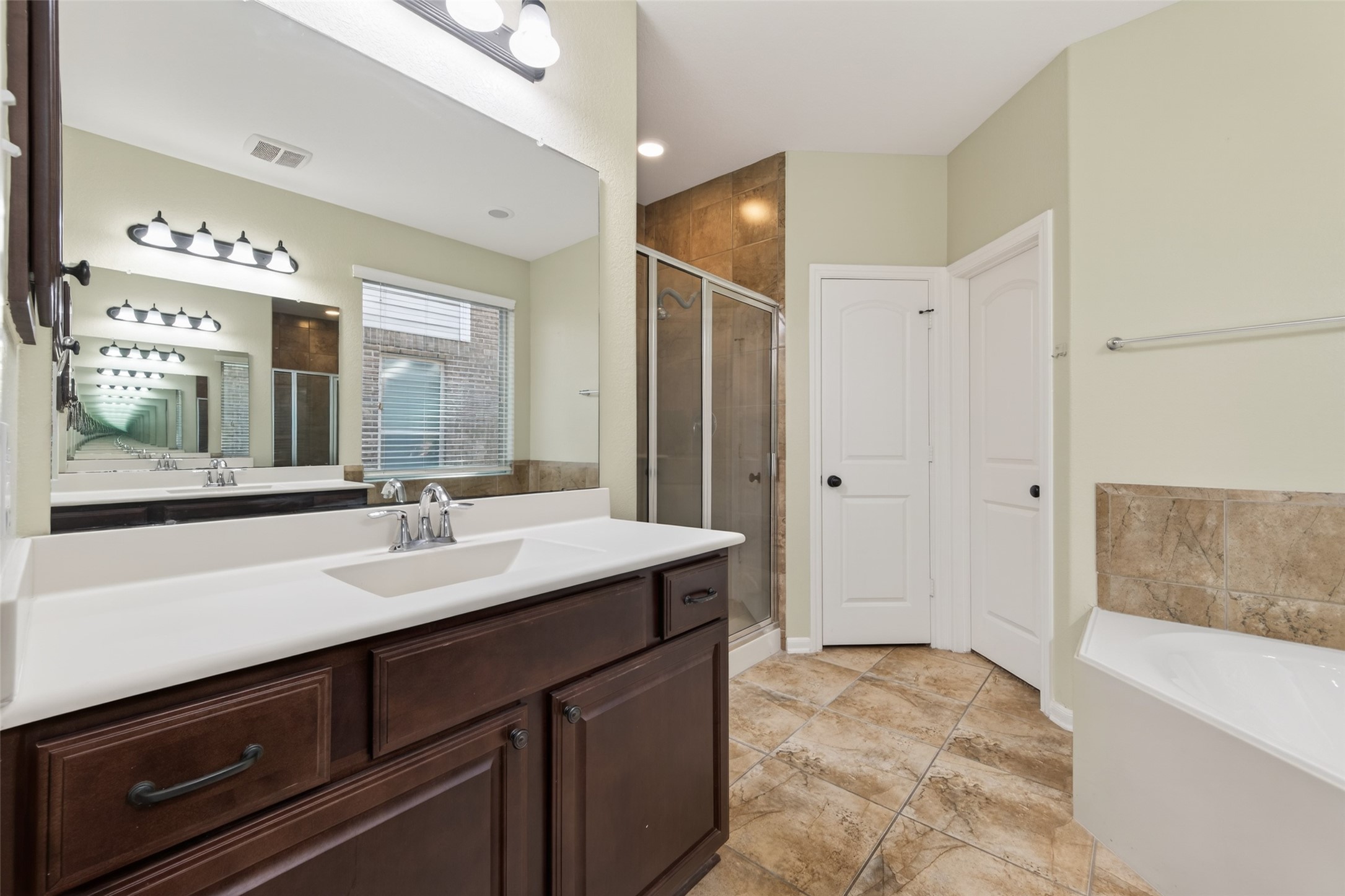 6 Painted Post Place Spring, TX 77389 - Photo 40 of 49 a bathroom with a sink and a mirror