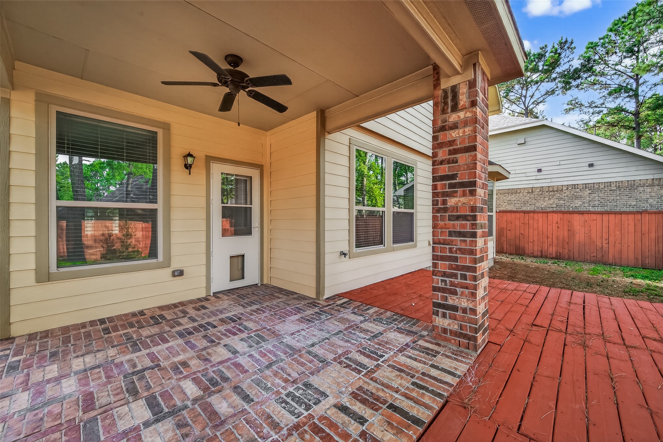 6 Painted Post Place Spring, TX 77389 - Photo 47 of 49 a view of a porch with wooden floor and outdoor space