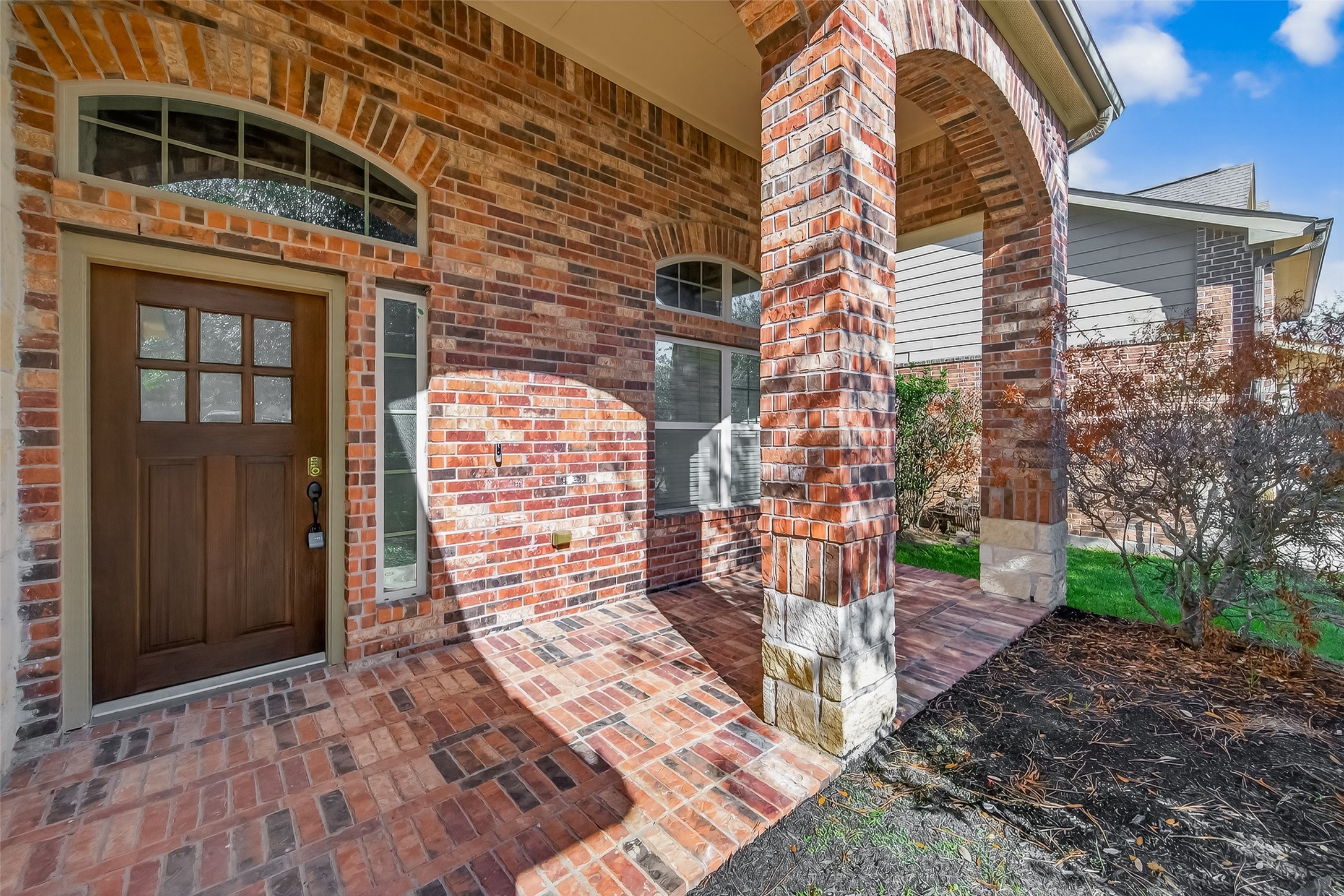 6 Painted Post Place Spring, TX 77389 - Photo 5 of 49 a view of a brick building with many windows
