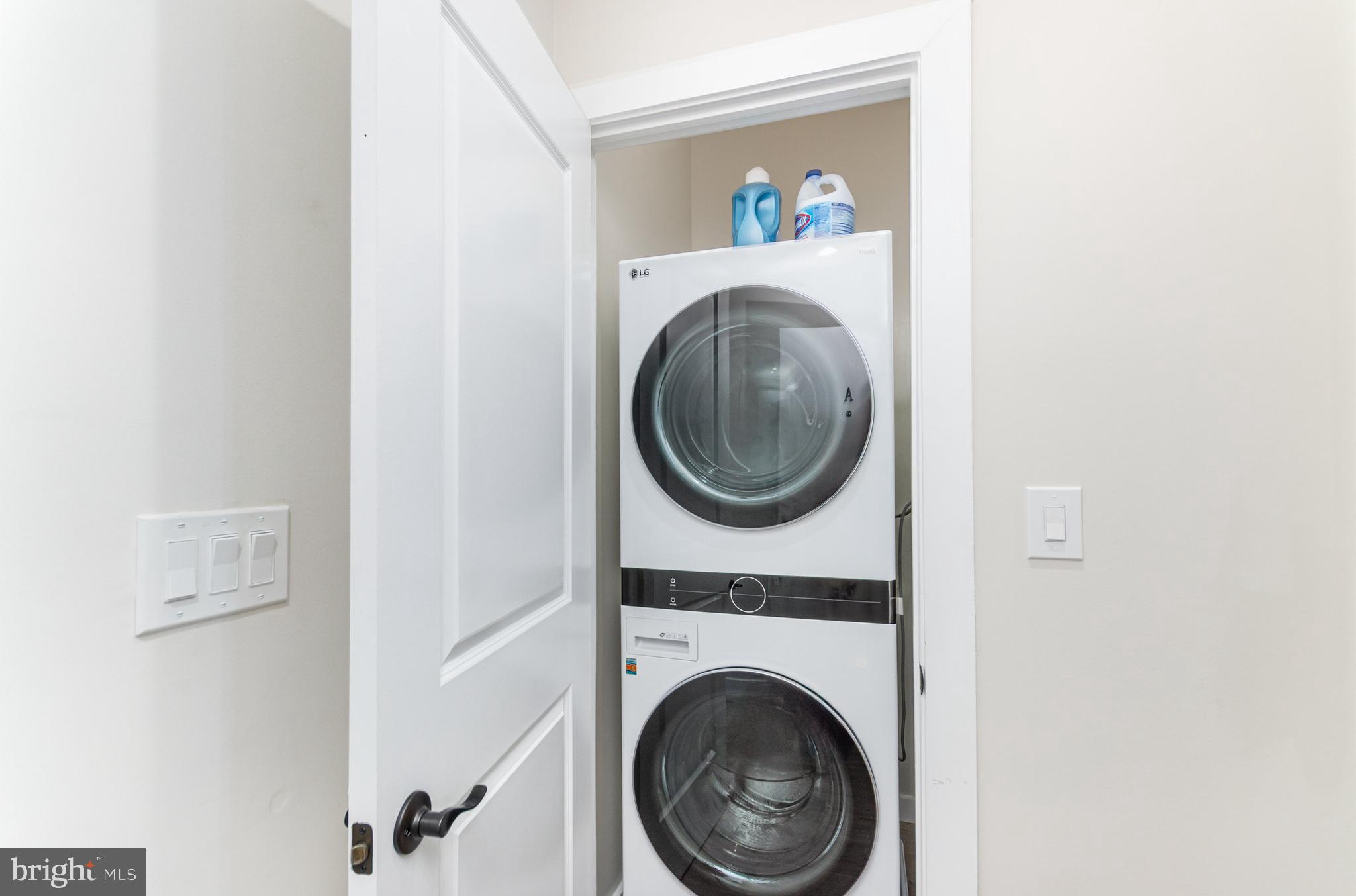 2116 4th Street Northeast, Unit A Washington, DC 20002 - Photo 11 of 17 a close up view of a washer and dryer