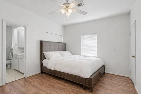 a bedroom with a bed and closet