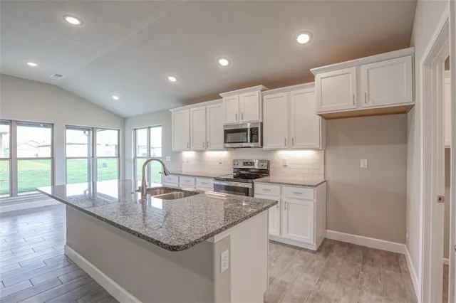 $457,350 | 8357 North Greentree Drive, Lenexa, KS 66227