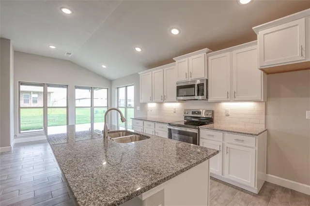 $457,350 | 8357 North Greentree Drive, Lenexa, KS 66227