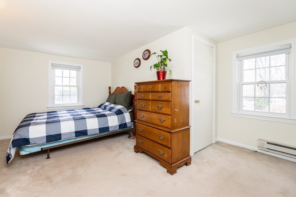16 Birch Road Framingham, MA 01701 - Photo 20 of 39 a bedroom with a bed and window