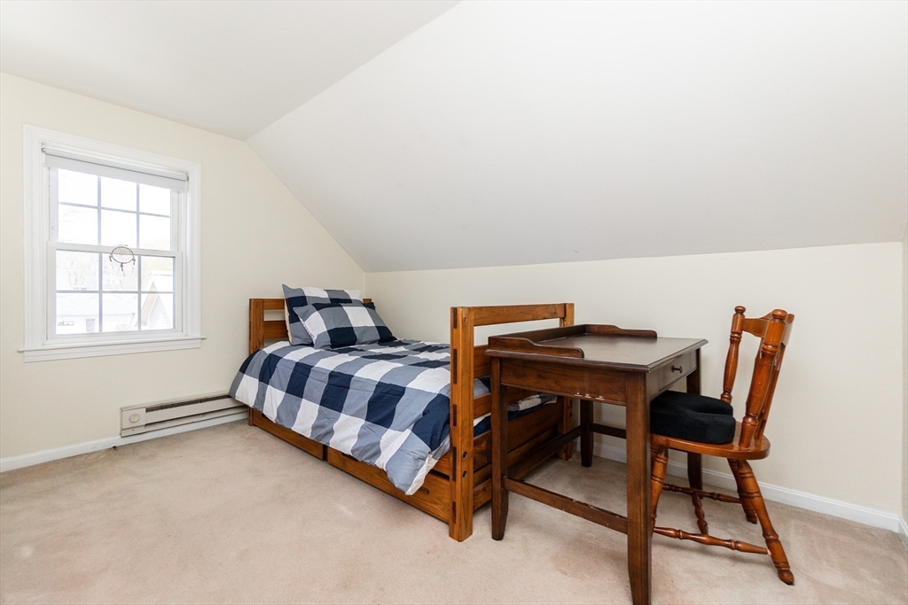 16 Birch Road Framingham, MA 01701 - Photo 21 of 39 a bedroom with a bed and a desk
