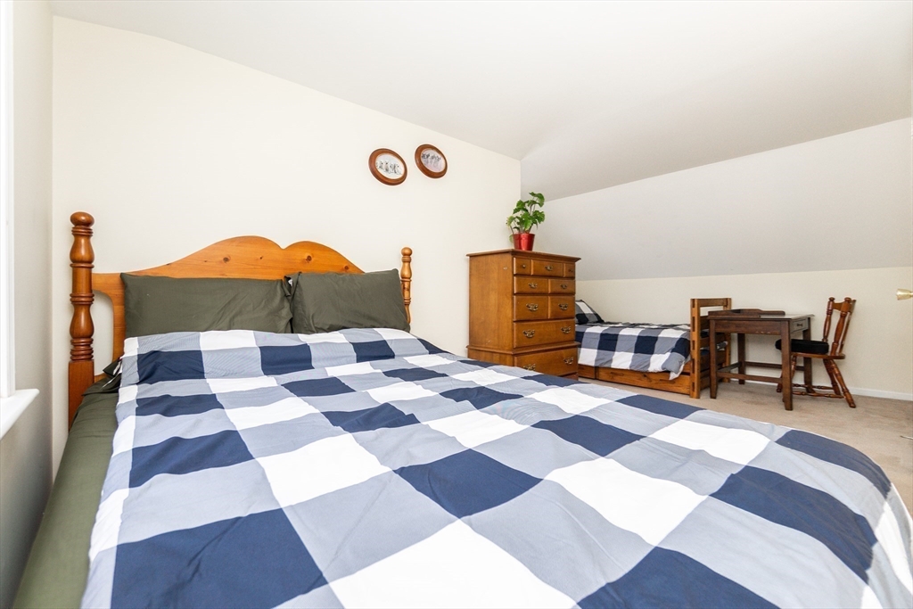 16 Birch Road Framingham, MA 01701 - Photo 23 of 39 a rug sitting area with a table and chairs