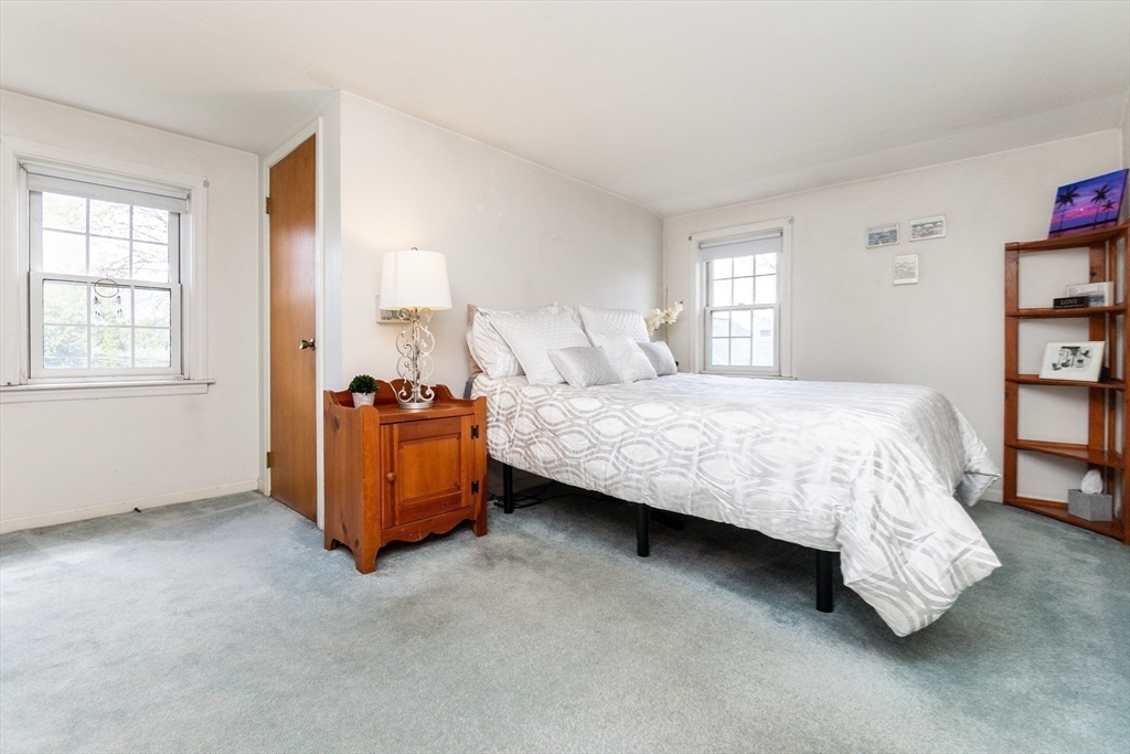 16 Birch Road Framingham, MA 01701 - Photo 26 of 39 a bedroom with a bed and a window