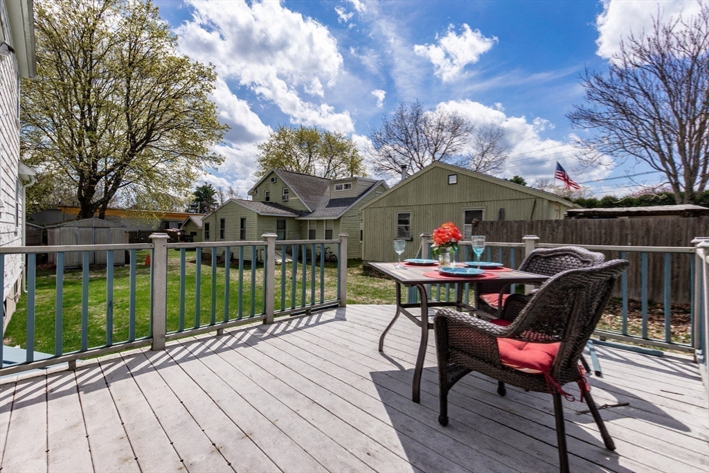 16 Birch Road Framingham, MA 01701 - Photo 33 of 39 a view of a chairs and tables in the deck
