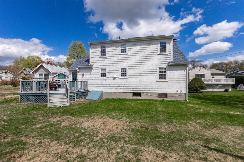 16 Birch Road Framingham, MA 01701 - Photo 36 of 39 a front view of a house with a yard