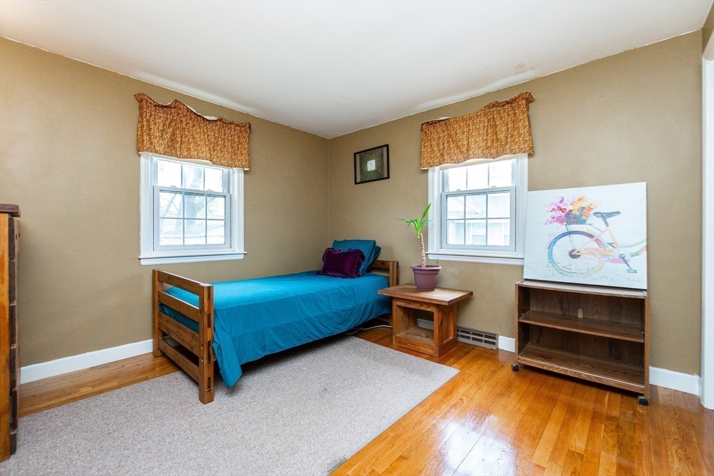 16 Birch Road Framingham, MA 01701 - Photo 7 of 39 a bedroom with furniture and a window