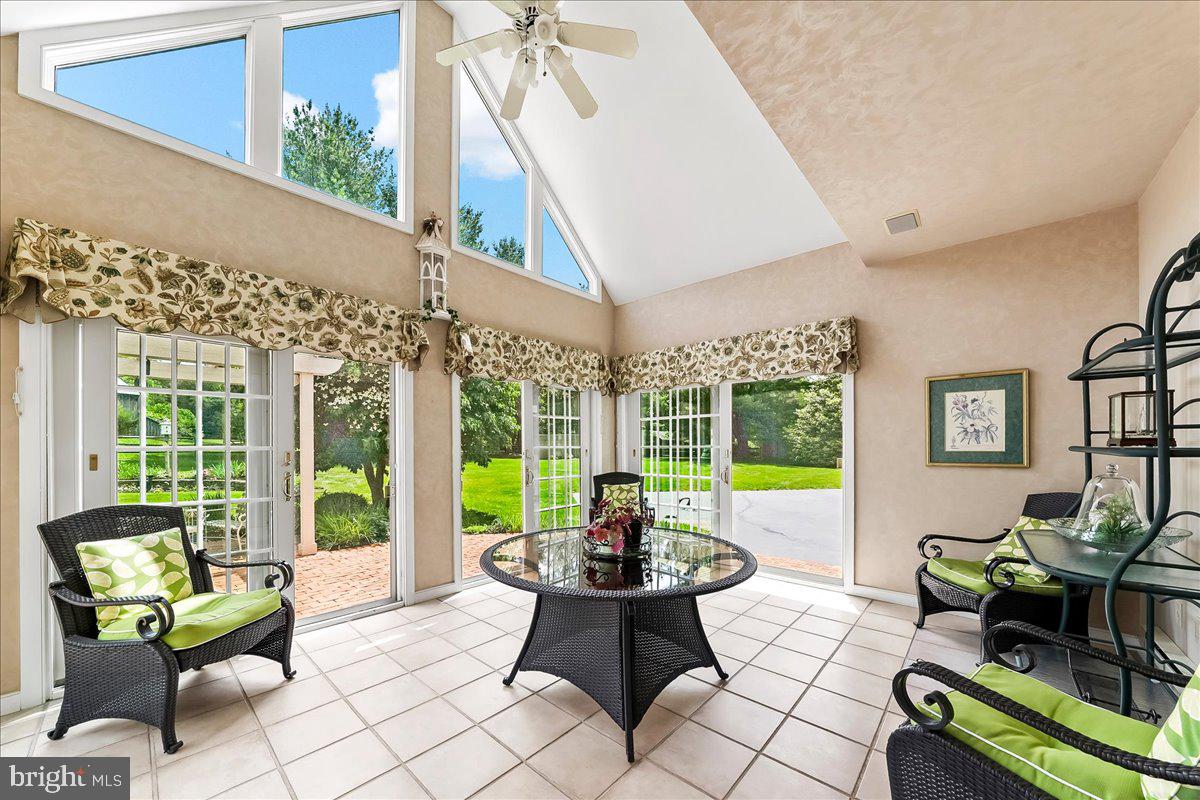 7 Bolingbroke Road West Chester, PA 19382 - Photo 46 of 86 Bright sunroom with lush views.